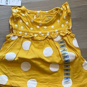 NWT girl’s romper by Carter’s